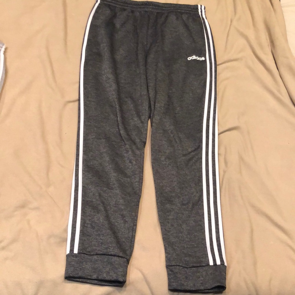 Gray and white Adidas joggers